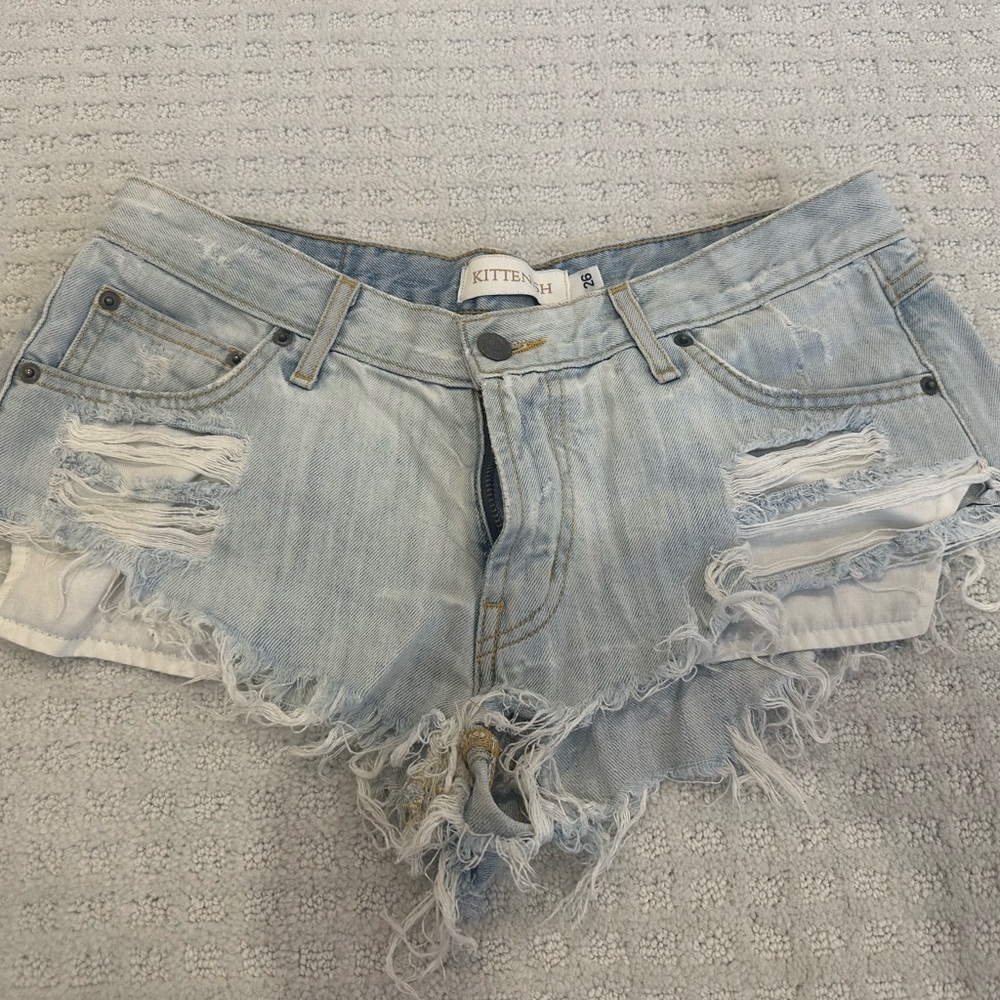 Kittenish Faded Blue Ripped Jean Shorts white trash shorts